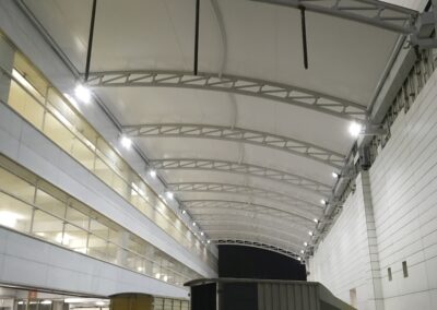 Tensile roof covers for sports arenas with high-strength materials.