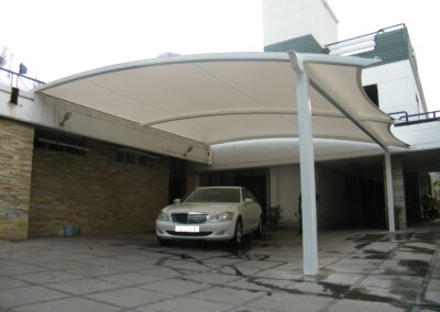 Custom-designed tensile structures for car parking, offering style and functionality.