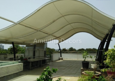 Commercial tensile structures for outdoor seating and event spaces.