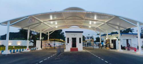 A modern tensile roofing installation showcasing a sleek design with a white fabric canopy.